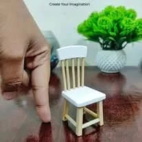 A chair beside a fingertip